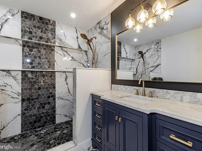 Blackwood House — photo 7 Bathroom with navy vanity