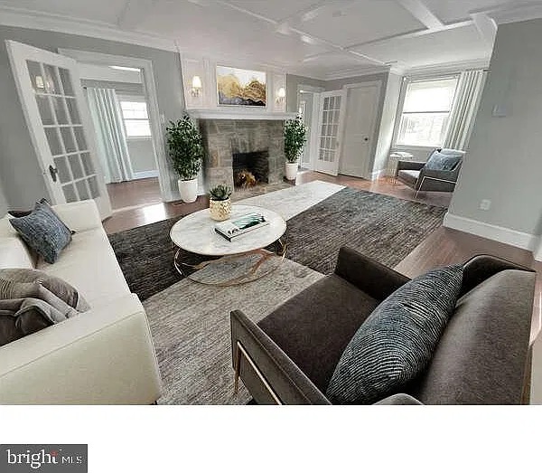 Conestoga House — photo 1 Conestoga House living room with stone fireplace
