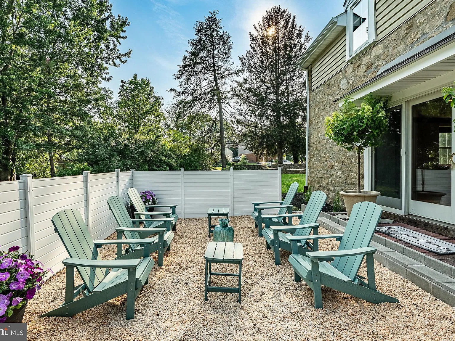 Brighton House — photo 5 Gravel patio with Adirondack chairs