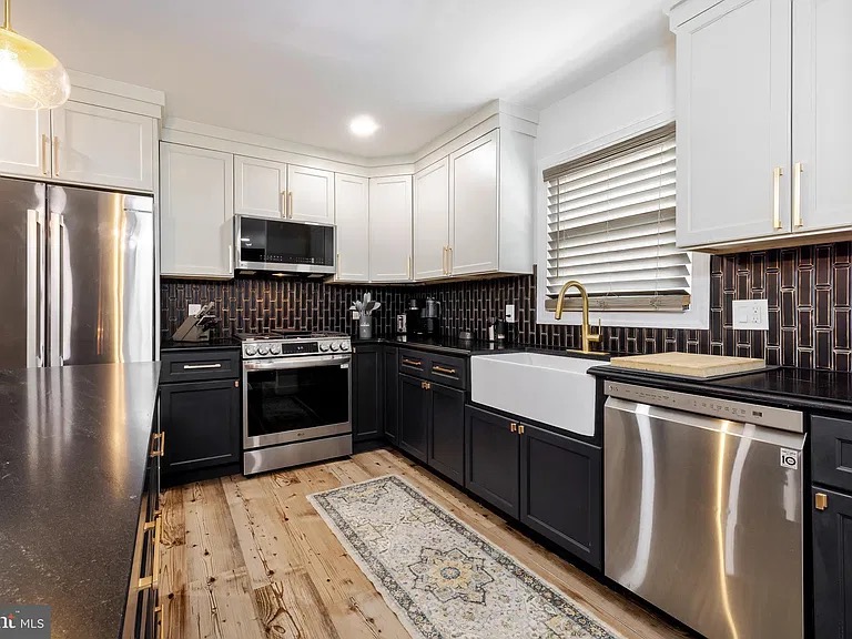 Blackwood House — photo 4 Kitchen with stainless appliances